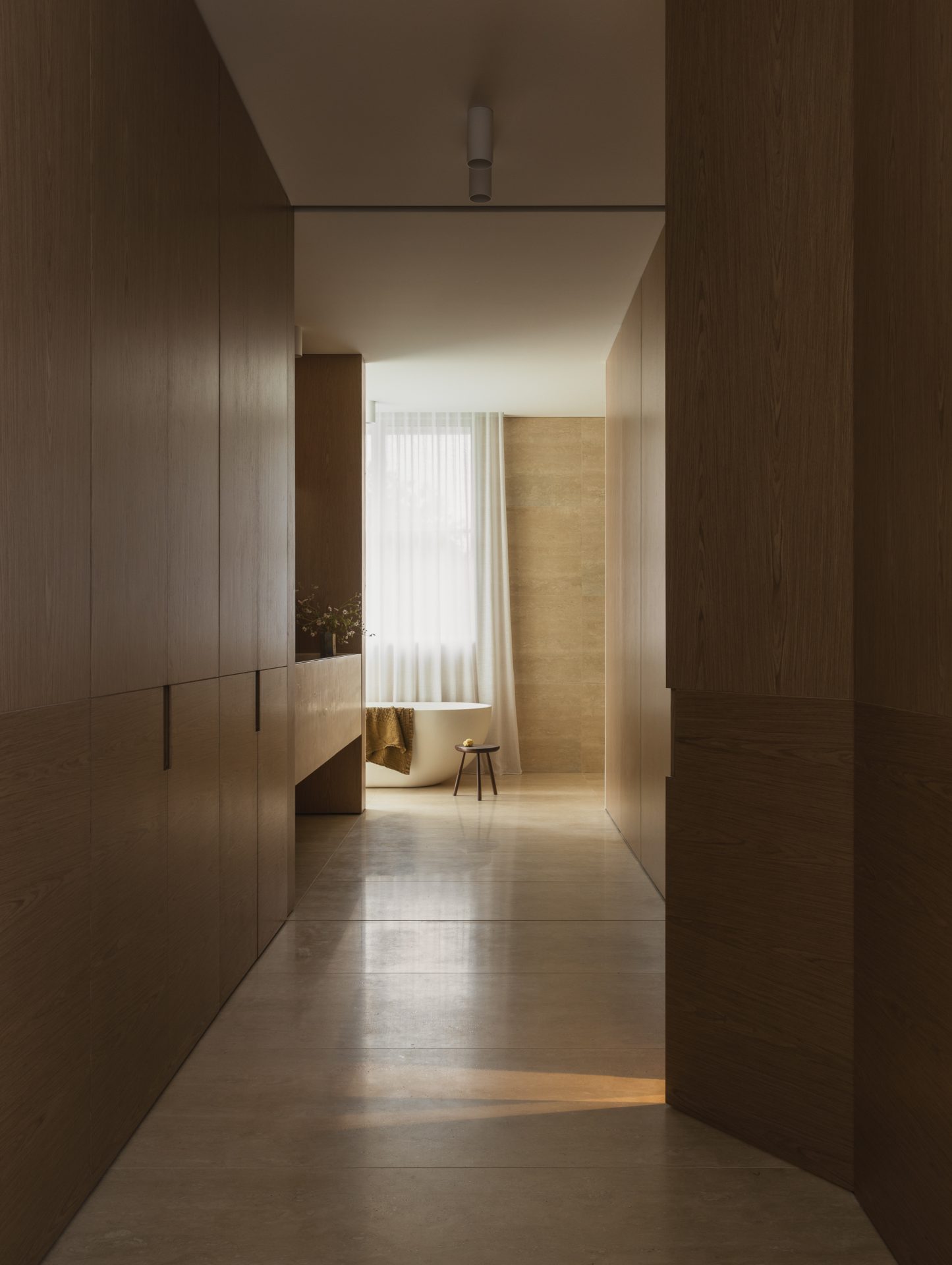 Timber-lined hallway leading to the ensuite at Melody House